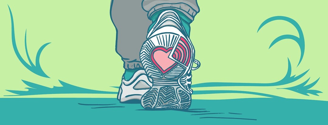 Close up of shoes walking. On the sole there is a heart symbolizing self-love in the form of exercise.